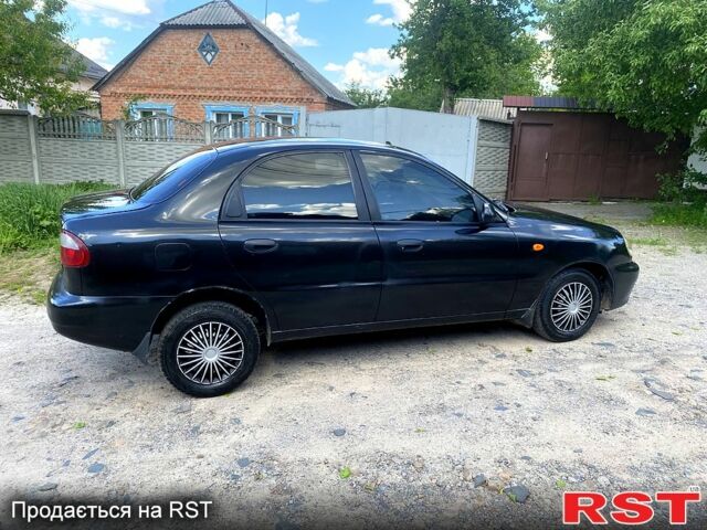 Черный Дэу Ланос, объемом двигателя 1.5 л и пробегом 200 тыс. км за 1850 $, фото 5 на Automoto.ua