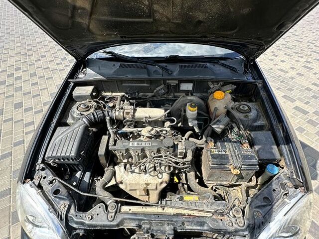 Черный Дэу Ланос, объемом двигателя 1.5 л и пробегом 176 тыс. км за 2899 $, фото 12 на Automoto.ua