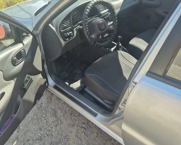Черный Дэу Ланос, объемом двигателя 1.5 л и пробегом 255 тыс. км за 2500 $, фото 9 на Automoto.ua