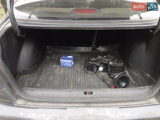 Черный Дэу Ланос, объемом двигателя 1.5 л и пробегом 141 тыс. км за 1700 $, фото 9 на Automoto.ua