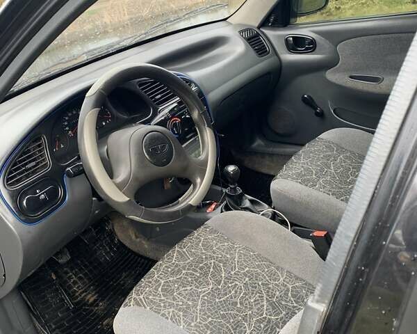 Деу Ланос 2007 у Тернополі на Automoto.ua Чорний Деу Ланос, об'ємом двигуна 1.5 л та пробігом 219 тис. км за 2100 $, фото 9 на Automoto.ua