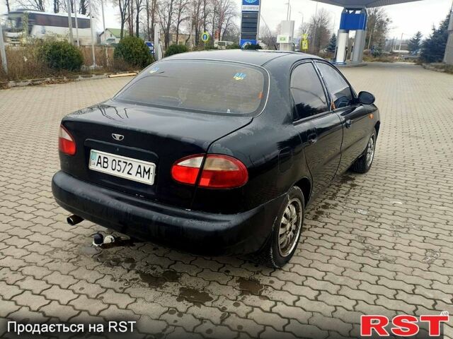 Черный Дэу Ланос, объемом двигателя 1.6 л и пробегом 200 тыс. км за 1600 $, фото 3 на Automoto.ua