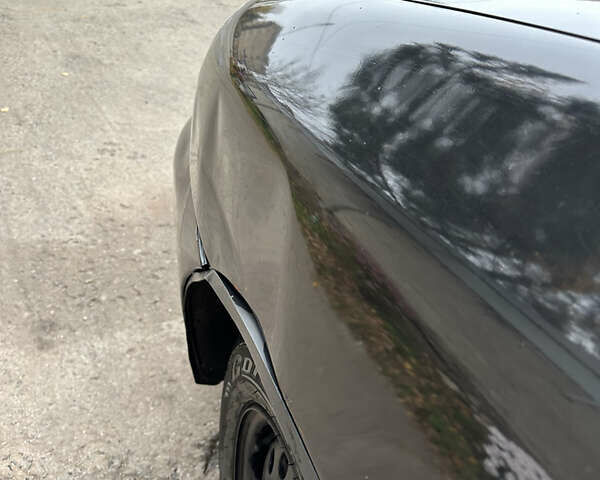 Черный Дэу Ланос, объемом двигателя 1.6 л и пробегом 140 тыс. км за 2700 $, фото 6 на Automoto.ua