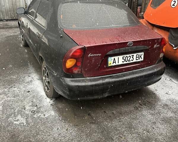 Чорний Деу Ланос, об'ємом двигуна 1.5 л та пробігом 256 тис. км за 1400 $, фото 1 на Automoto.ua