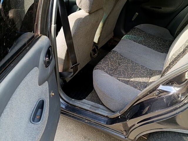 Дэу Ланос 2007 в Днепре (Днепропетровске) на Automoto.ua Черный Дэу Ланос, объемом двигателя 1.5 л и пробегом 217 тыс. км за 1650 $, фото 7 на Automoto.ua