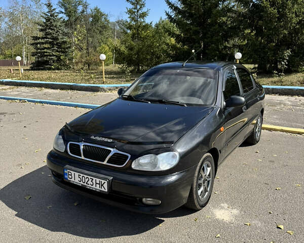Черный Дэу Ланос, объемом двигателя 1.5 л и пробегом 175 тыс. км за 2800 $, фото 2 на Automoto.ua