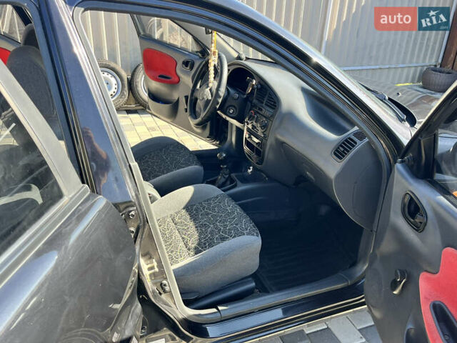 Чорний Деу Ланос, об'ємом двигуна 1.5 л та пробігом 180 тис. км за 2900 $, фото 11 на Automoto.ua