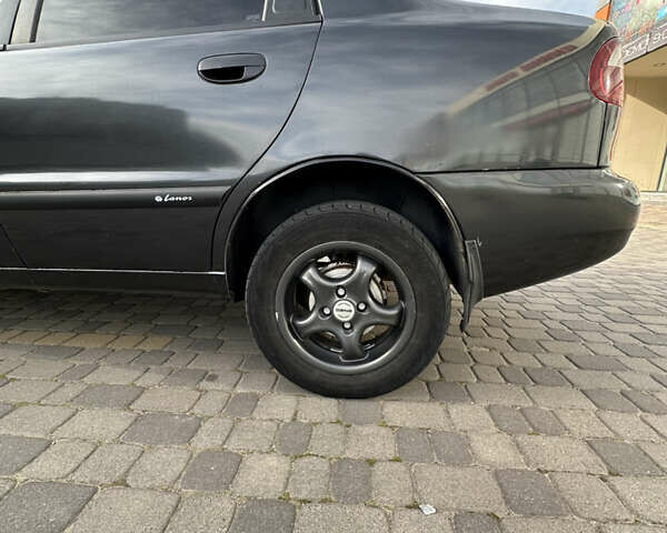 Чорний Деу Ланос, об'ємом двигуна 1.5 л та пробігом 181 тис. км за 1888 $, фото 7 на Automoto.ua