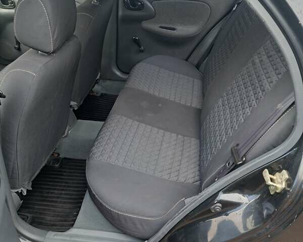 Черный Дэу Ланос, объемом двигателя 1.5 л и пробегом 158 тыс. км за 1250 $, фото 11 на Automoto.ua