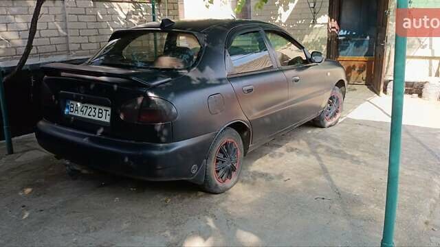 Черный Дэу Ланос, объемом двигателя 1.5 л и пробегом 236 тыс. км за 2300 $, фото 6 на Automoto.ua