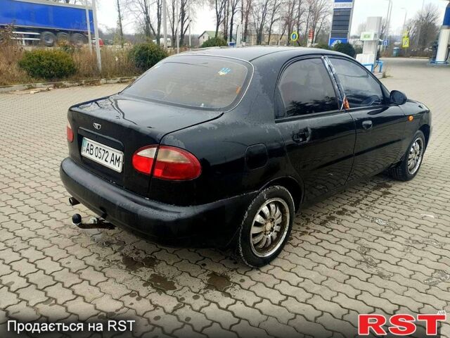 Черный Дэу Ланос, объемом двигателя 1.6 л и пробегом 200 тыс. км за 1600 $, фото 4 на Automoto.ua