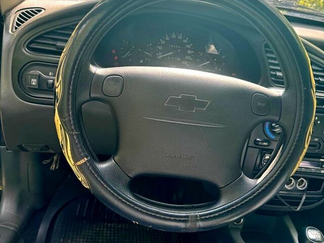 Черный Дэу Ланос, объемом двигателя 1.5 л и пробегом 160 тыс. км за 3300 $, фото 10 на Automoto.ua