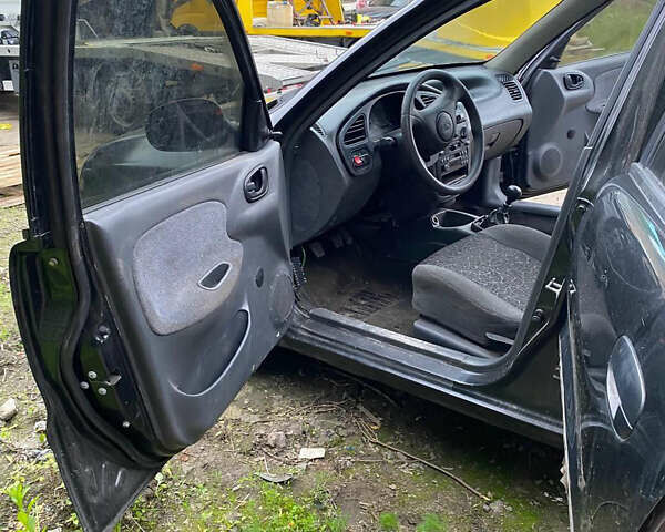 Черный Дэу Ланос, объемом двигателя 0 л и пробегом 250 тыс. км за 2000 $, фото 12 на Automoto.ua