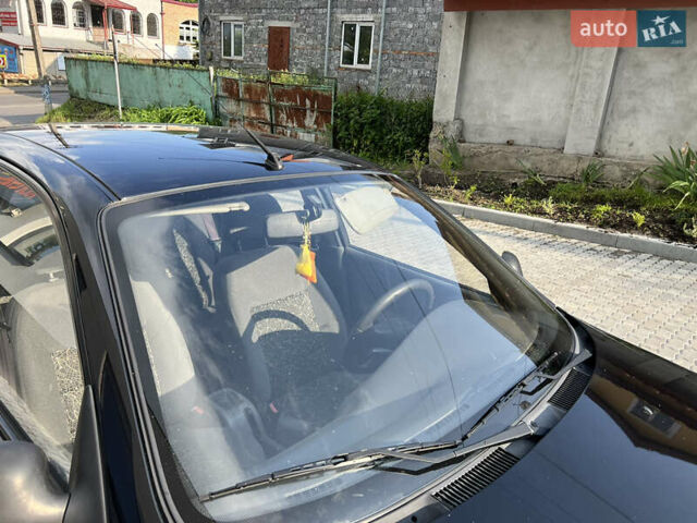 Черный Дэу Ланос, объемом двигателя 1.4 л и пробегом 78 тыс. км за 1850 $, фото 10 на Automoto.ua