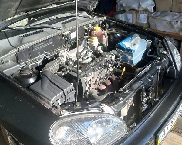 Чорний Деу Ланос, об'ємом двигуна 1.5 л та пробігом 157 тис. км за 1650 $, фото 8 на Automoto.ua