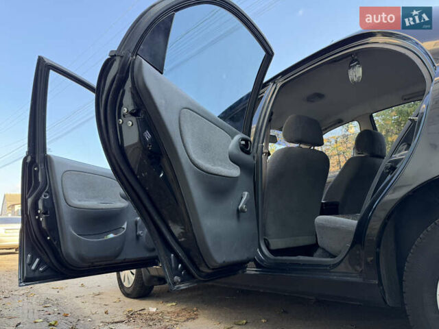 Черный Дэу Ланос, объемом двигателя 1.5 л и пробегом 100 тыс. км за 2900 $, фото 8 на Automoto.ua