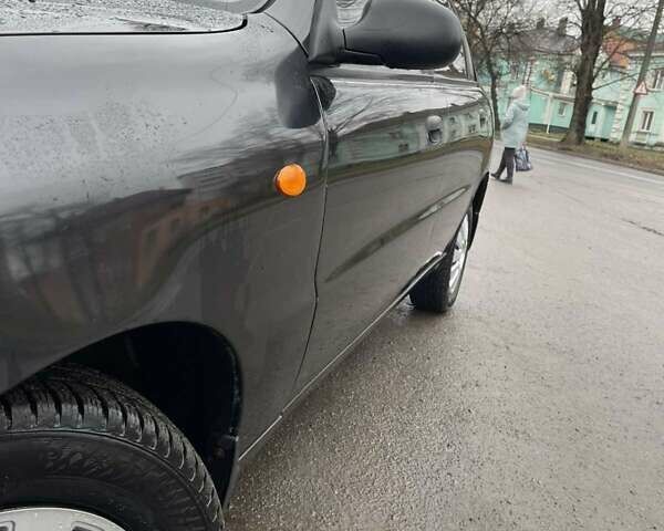 Чорний Деу Ланос, об'ємом двигуна 1.5 л та пробігом 167 тис. км за 2999 $, фото 1 на Automoto.ua