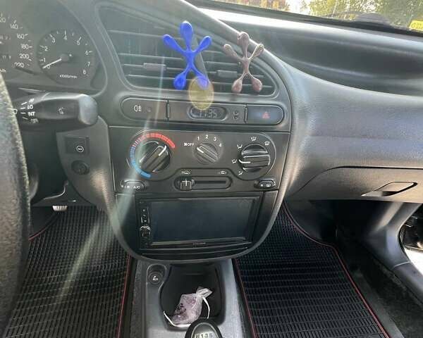 Черный Дэу Ланос, объемом двигателя 1.6 л и пробегом 137 тыс. км за 3600 $, фото 16 на Automoto.ua