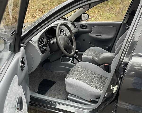 Чорний Деу Ланос, об'ємом двигуна 1.5 л та пробігом 167 тис. км за 2999 $, фото 14 на Automoto.ua