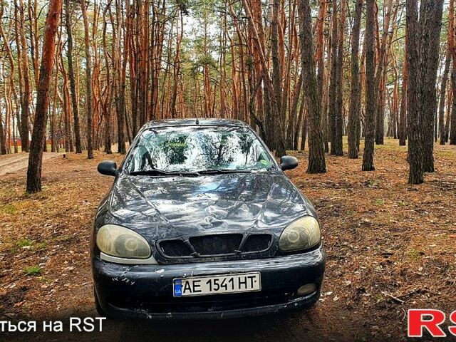 Черный Дэу Ланос, объемом двигателя 1.4 л и пробегом 234 тыс. км за 1600 $, фото 1 на Automoto.ua