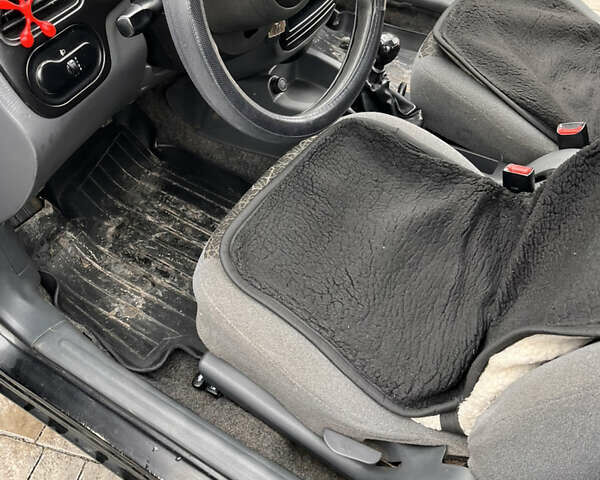 Черный Дэу Ланос, объемом двигателя 1.5 л и пробегом 130 тыс. км за 2300 $, фото 11 на Automoto.ua