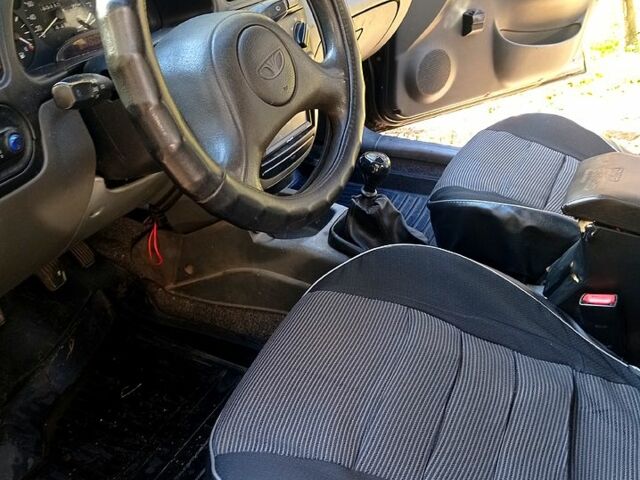 Черный Дэу Ланос, объемом двигателя 1.5 л и пробегом 365 тыс. км за 2000 $, фото 5 на Automoto.ua