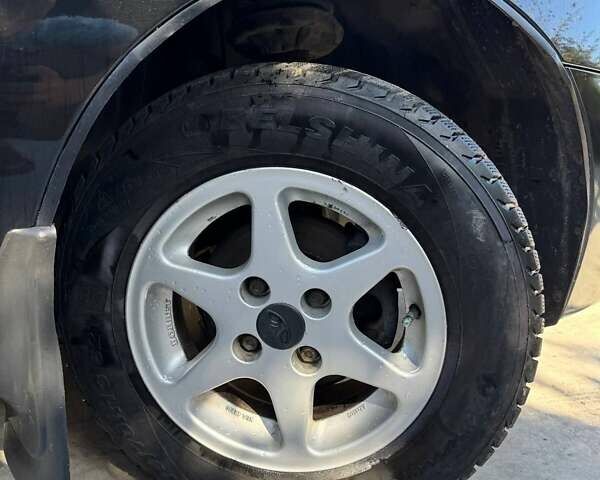 Чорний Деу Ланос, об'ємом двигуна 1.5 л та пробігом 77 тис. км за 2900 $, фото 4 на Automoto.ua