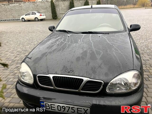 Чорний Деу Ланос, об'ємом двигуна 1.5 л та пробігом 198 тис. км за 1700 $, фото 3 на Automoto.ua