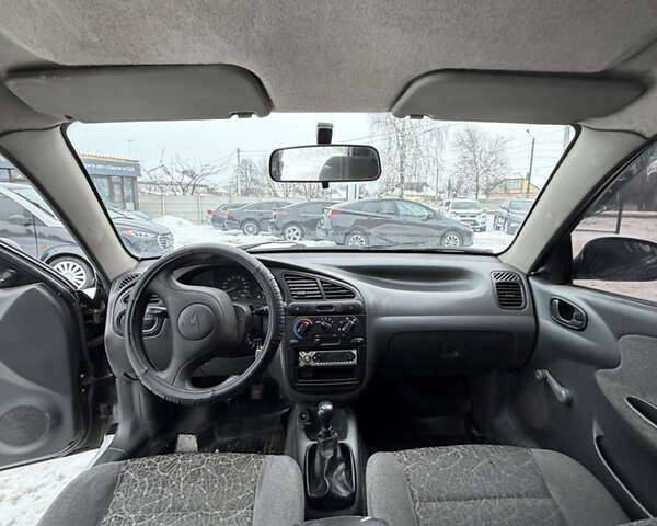 Черный Дэу Ланос, объемом двигателя 1.5 л и пробегом 280 тыс. км за 2350 $, фото 7 на Automoto.ua