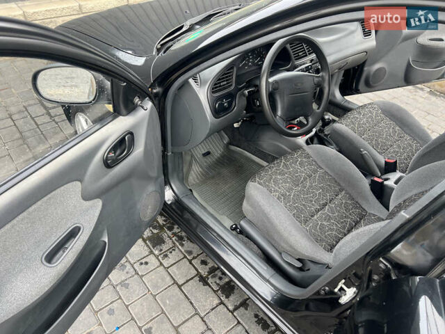 Дэу Ланос 2008 в Одессе на Automoto.ua Черный Дэу Ланос, объемом двигателя 1.6 л и пробегом 181 тыс. км за 2900 $, фото 16 на Automoto.ua