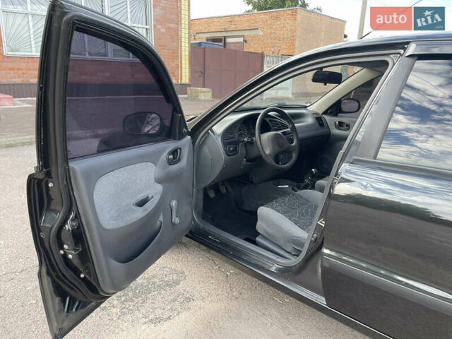 Черный Дэу Ланос, объемом двигателя 1.5 л и пробегом 122 тыс. км за 2950 $, фото 43 на Automoto.ua