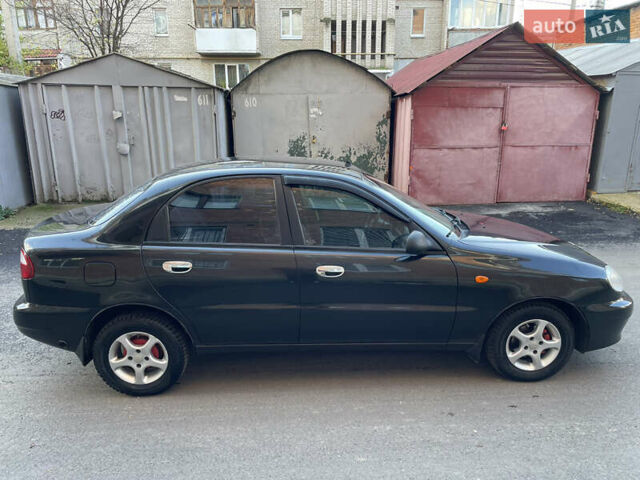 Черный Дэу Ланос, объемом двигателя 1.4 л и пробегом 233 тыс. км за 2500 $, фото 10 на Automoto.ua