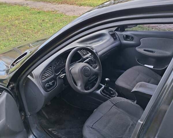 Чорний Деу Ланос, об'ємом двигуна 1.5 л та пробігом 219 тис. км за 1900 $, фото 6 на Automoto.ua