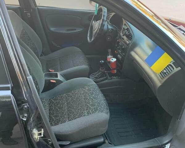 Чорний Деу Ланос, об'ємом двигуна 1.5 л та пробігом 245 тис. км за 3100 $, фото 13 на Automoto.ua