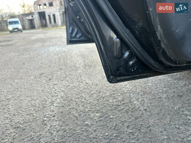 Черный Дэу Ланос, объемом двигателя 1.4 л и пробегом 220 тыс. км за 1450 $, фото 10 на Automoto.ua