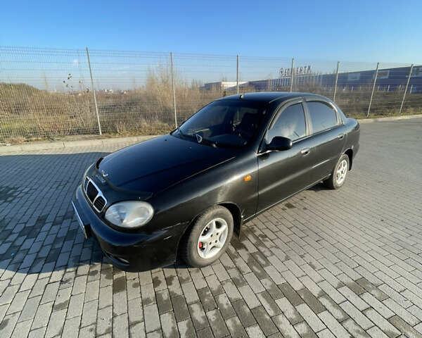 Черный Дэу Ланос, объемом двигателя 1.4 л и пробегом 177 тыс. км за 1750 $, фото 2 на Automoto.ua