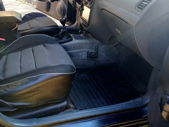 Черный Дэу Ланос, объемом двигателя 1.5 л и пробегом 365 тыс. км за 2000 $, фото 8 на Automoto.ua