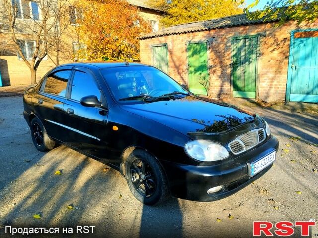 Чорний Деу Ланос, об'ємом двигуна 1.6 л та пробігом 238 тис. км за 2700 $, фото 2 на Automoto.ua