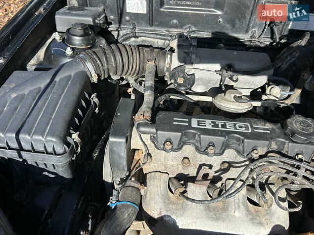 Черный Дэу Ланос, объемом двигателя 1.5 л и пробегом 152 тыс. км за 1550 $, фото 7 на Automoto.ua