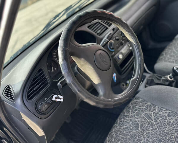Черный Дэу Ланос, объемом двигателя 1.5 л и пробегом 150 тыс. км за 2150 $, фото 7 на Automoto.ua