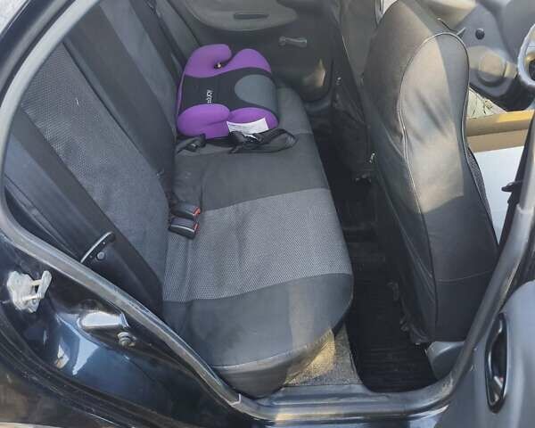 Черный Дэу Ланос, объемом двигателя 1.5 л и пробегом 216 тыс. км за 2699 $, фото 6 на Automoto.ua