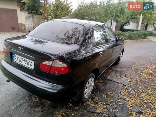 Чорний Деу Ланос, об'ємом двигуна 1.5 л та пробігом 351 тис. км за 2000 $, фото 2 на Automoto.ua
