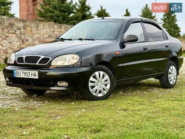 Черный Дэу Ланос, объемом двигателя 1.5 л и пробегом 230 тыс. км за 2600 $, фото 1 на Automoto.ua