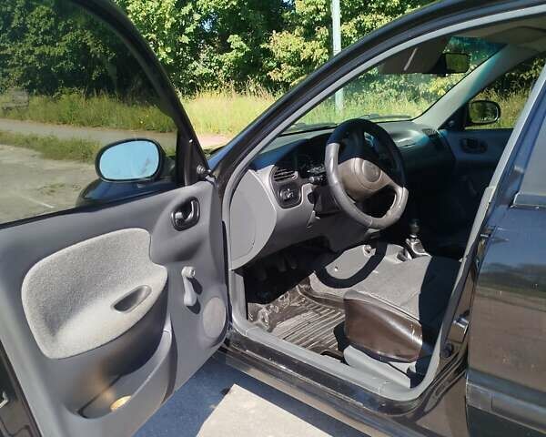 Черный Дэу Ланос, объемом двигателя 1.5 л и пробегом 157 тыс. км за 3200 $, фото 9 на Automoto.ua