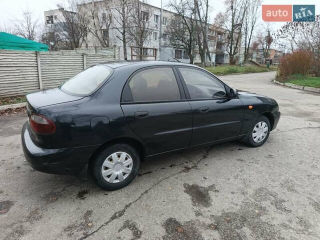 Черный Дэу Ланос, объемом двигателя 1.5 л и пробегом 240 тыс. км за 1800 $, фото 7 на Automoto.ua