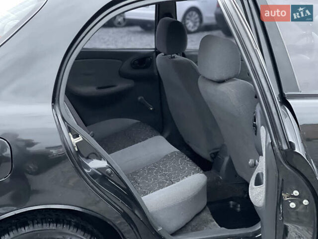 Чорний Деу Ланос, об'ємом двигуна 1.6 л та пробігом 139 тис. км за 2350 $, фото 17 на Automoto.ua