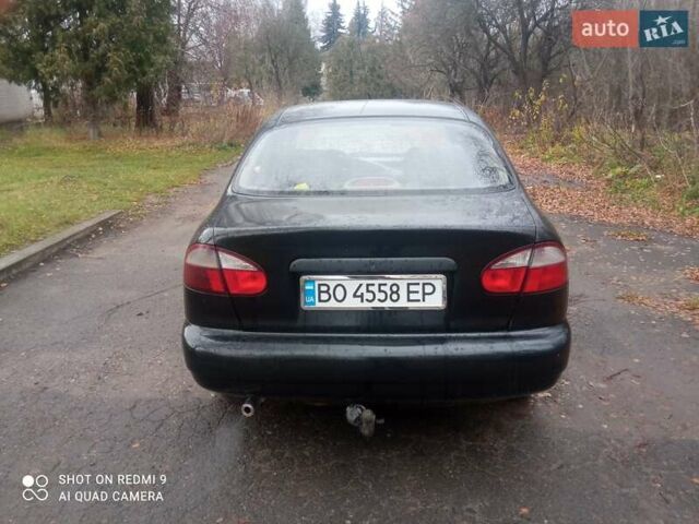 Чорний Деу Ланос, об'ємом двигуна 1.6 л та пробігом 230 тис. км за 1750 $, фото 6 на Automoto.ua