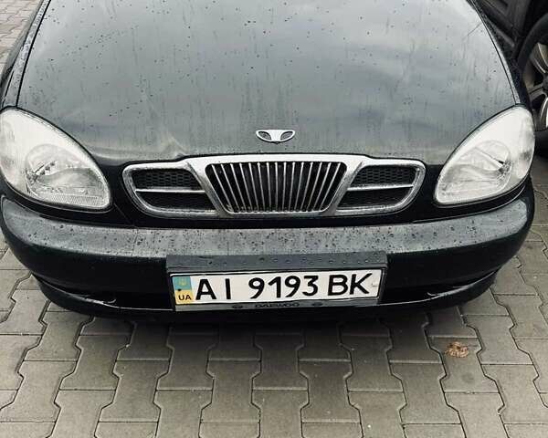 Черный Дэу Ланос, объемом двигателя 1.6 л и пробегом 87 тыс. км за 3300 $, фото 3 на Automoto.ua