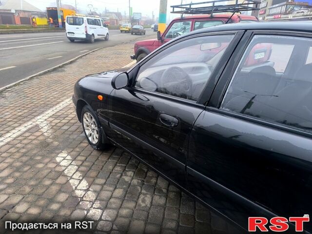 Черный Дэу Ланос, объемом двигателя 1.5 л и пробегом 220 тыс. км за 1000 $, фото 9 на Automoto.ua