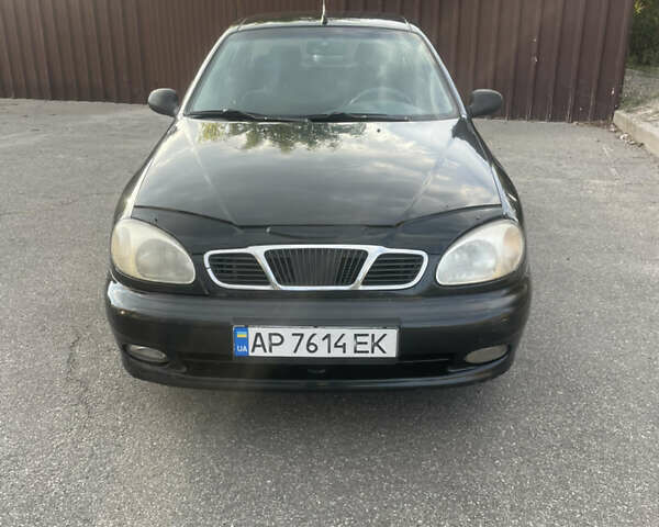Чорний Деу Ланос, об'ємом двигуна 1.5 л та пробігом 217 тис. км за 2200 $, фото 1 на Automoto.ua